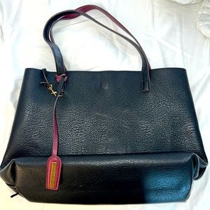 Reversible black and maroon leather tote by Street Level